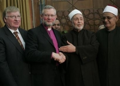 From left, Danish ambassador to Egypt, Bjarne Sorensen, Bishop Karsten Nissen, Egypt's highest Islamic authority, Mohammed Sayyed Tantawi, the Grand Sheik of al-Azhar and Al-Azhar Sheikh Omar Al-Deeb are seen after their meeting in Cairo, Egypt, Saturday,