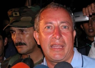 Catholic bishop Misael Vacca Ramirez arrives at a military base in Yopal, in northeast Colombia, after he was released by leftist rebels in the remote mountains near Morcote, some 120 miles northeast of Bogota, Tuesday, July 27, 2004. Guerrillas of the Na