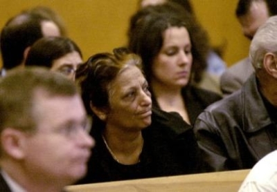 Ferial Garas, center, mother of Amal Garas, is seen in Jersey City Superior Court, Friday, March 4, 2005, in Jersery City, N.J., during an arraignment hearing for Edward McDonald, 25, and Hamilton Sanchez, 30. Both men pleaded not guilty to four counts of