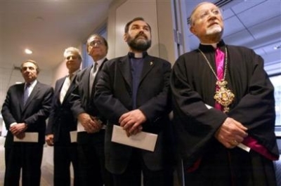 Joseph Basralian, far left, representing the Armenian General Benevolent Union, Andrew Torigian, second from left, representing the Armenian Missionary Association of America, Sam Mikaelian, center, representing the Armenian Church of America, Rev. Anoush