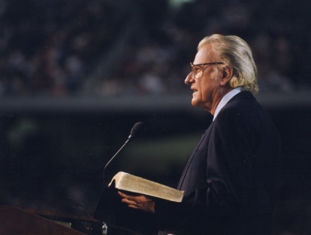 Billy Graham preaches at a crusade, which are a part of the television broadcasts of the new BGEA ministry, My Hope.