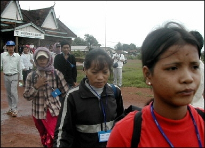 Montagnards Vietnamese walks to their plane in Bang, the province of Ratanakiri to be transported to the air to Phnom Penh. Hundreds of Montagnards Vietnamese fled the repressive Vietnamese government to Cambodia, hoping for better lives abroad.