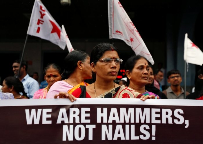 People attend a protest against what they say are attacks on India's low-caste Dalit community in Mumbai, India, July 27, 2016.