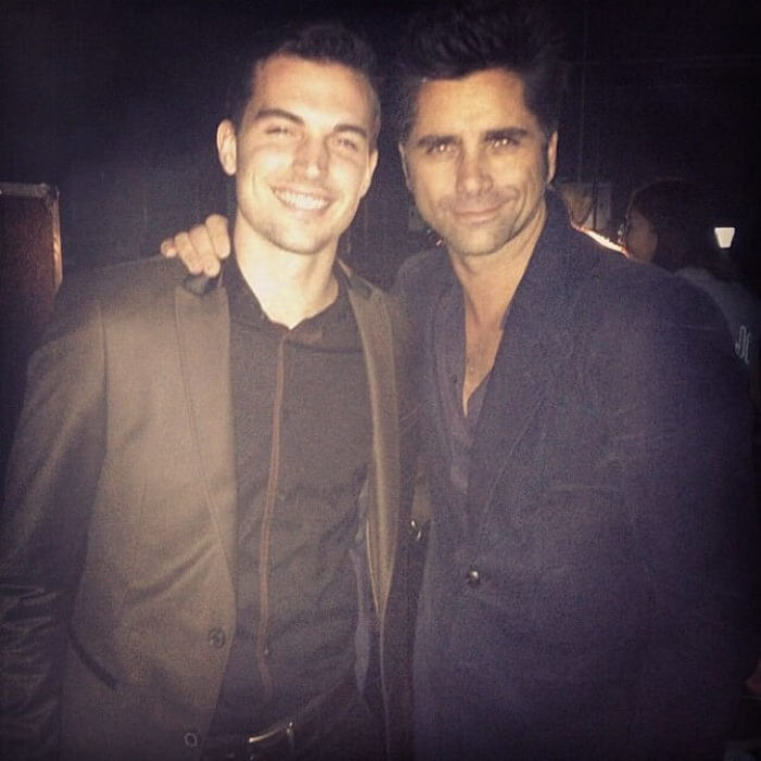 Jordan Baird (L) and actor John Stamos.