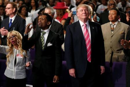 Republican presidential nominee Donald Trump attends a church service, in Detroit, Michigan, U.S., September 3, 2016.