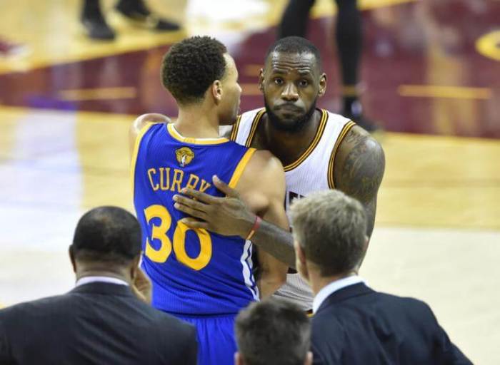 Cavaliers SF LeBron James hugs Warriors PG Steph Curry during Game 6 of the 2016 NBA Finals.