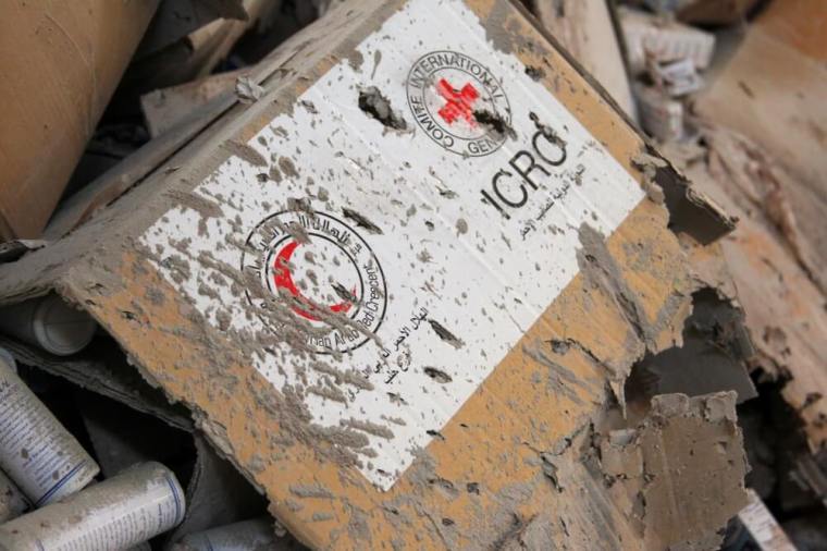 Damaged Red Cross and Red Crescent medical supplies lie inside a warehouse after an airstrike on the rebel held Urm al-Kubra town, western Aleppo city, Syria, September 20, 2016.