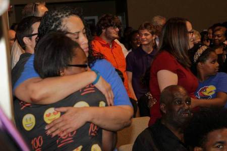 Members of the Tulsa community comfort each at a vigil to remember Terence Crutcher,40, at the Metropolitan Baptist Church on Wednesday September 21, 2016.