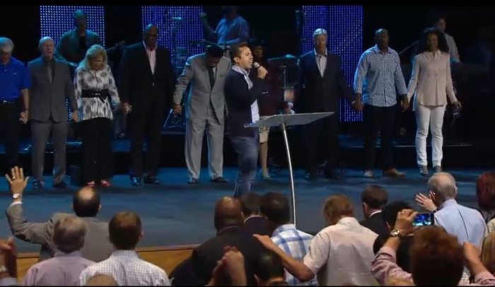 Rev. Samuel Rodriguez who serves as the President of the National Hispanic Christian Leadership Conference/CONEL, leads a message at the close of The Gathering at Gateway Church in Southlake, Texas, September 21, 2016.