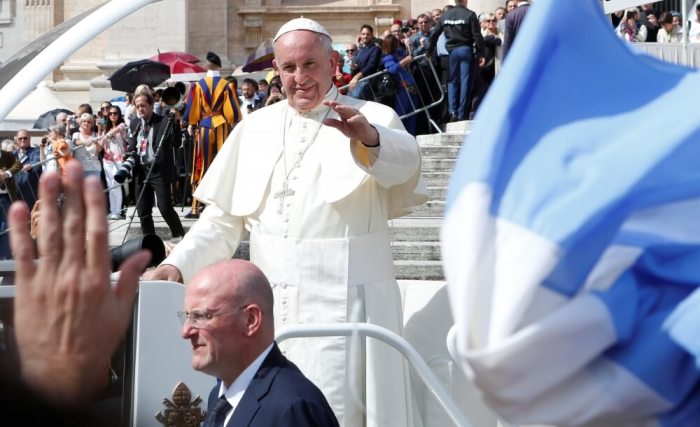 Pope Francis greets faithful at the end of the weekly audience in Saint Peter's Square at the Vatican, September 21, 2016.