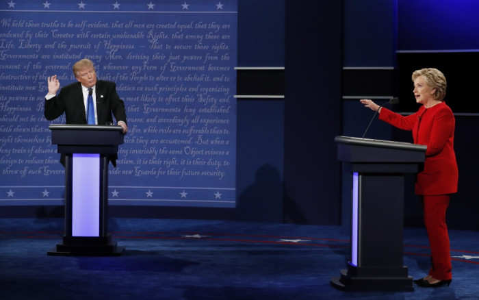 Republican U.S. presidential nominee Donald Trump and Democratic U.S. presidential nominee Hillary Clinton speak during their first presidential debate at Hofstra University in Hempstead, New York, U.S., September 26, 2016.