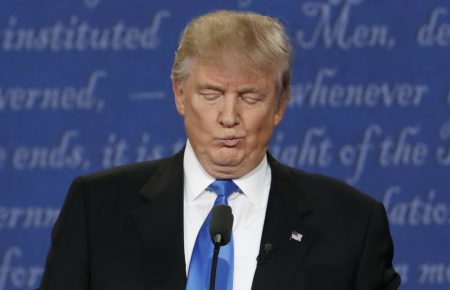 Republican U.S. presidential nominee Donald Trump reacts during the first presidential debate with Democratic U.S. presidential nominee Hillary Clinton at Hofstra University in Hempstead, New York, U.S., September 26, 2016.