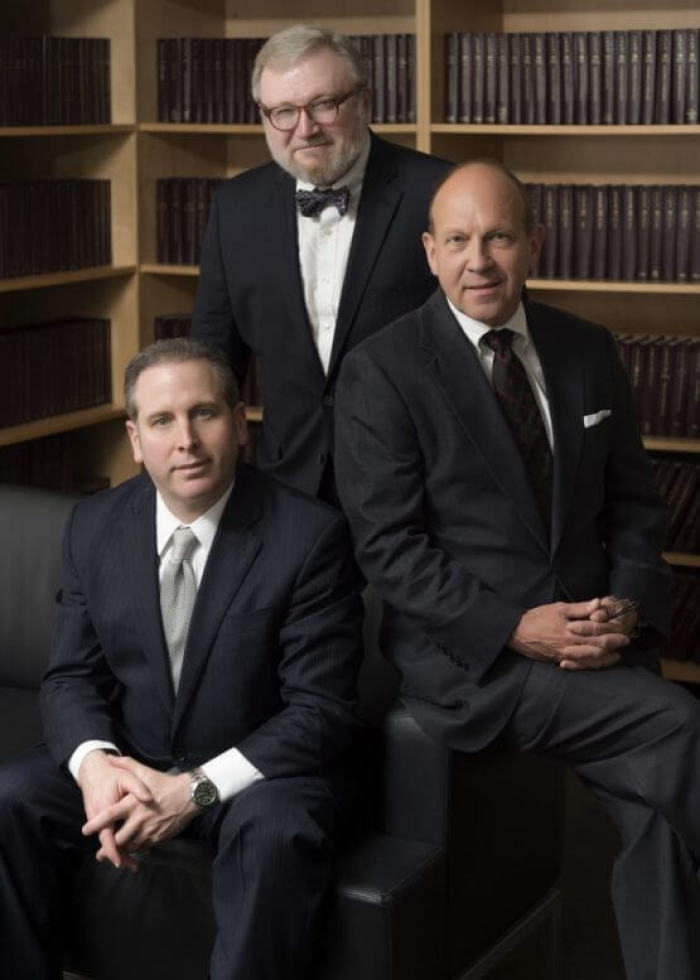 Nelson Madden Black LLP partners: (L-R) Barry Black , Jonathan Robert Nelson and John Madden.