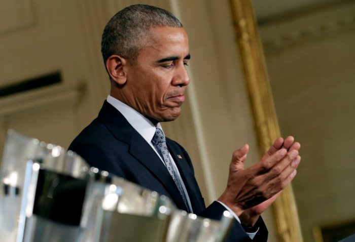 U.S. President Barack Obama reacts as he welcomes NASCAR driver Kyle Busch and his team to honor the Sprint Cup Series championship at the White House in Washington, U.S., September 28, 2016.