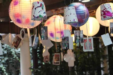 Ornaments dangle from the roof of a well-decorated sukkah at the Sukkah in the Sky event held at the Edmond J. Safra Synagogue in New York City on Thursday October 20, 2016.