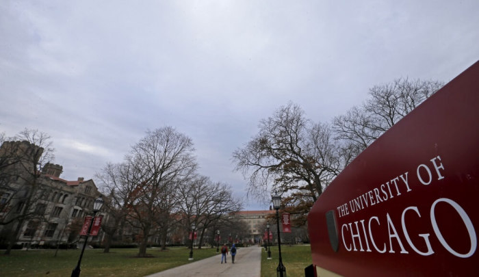 People walk through the Main Quadrangle at the University of Chicago in Chicago, Illinois, United States, November 30, 2015.