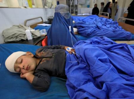 An Afghan boy wounded in an airstrike receives treatment at a hospital in Jalalabad, Afghanistan, October 28, 2016.