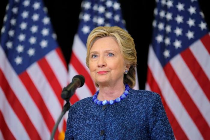 U.S. Democratic presidential nominee Hillary Clinton holds an unscheduled news conference to talk about FBI inquiries into her emails after a campaign rally in Des Moines, Iowa, October 28, 2016.