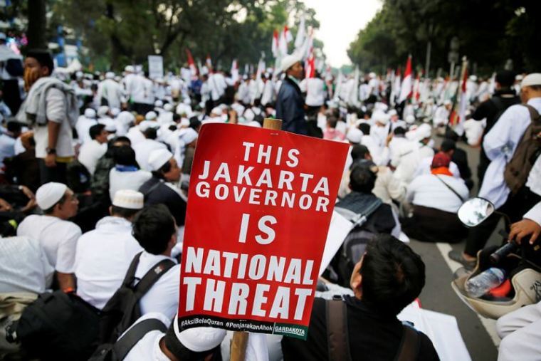 Members of hardline Muslim groups attend a protest against Jakarta's incumbent governor. Indonesia is the world's most populous Muslim country, where many people follow a moderate form of Islam. While hardliners have launched occasional agitation in the past, protests on such a large scale have been rare.