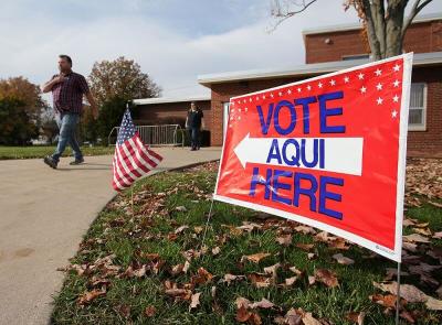 Voters leave a polling station after casting their votes during the U.S. presidential election in Olmsted Falls, Ohio, November 8, 2016.