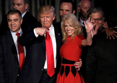 Donald Trump and his campaign manager Kellyanne Conway greet supporters during his election night rally in Manhattan, New York, November 8, 2016.