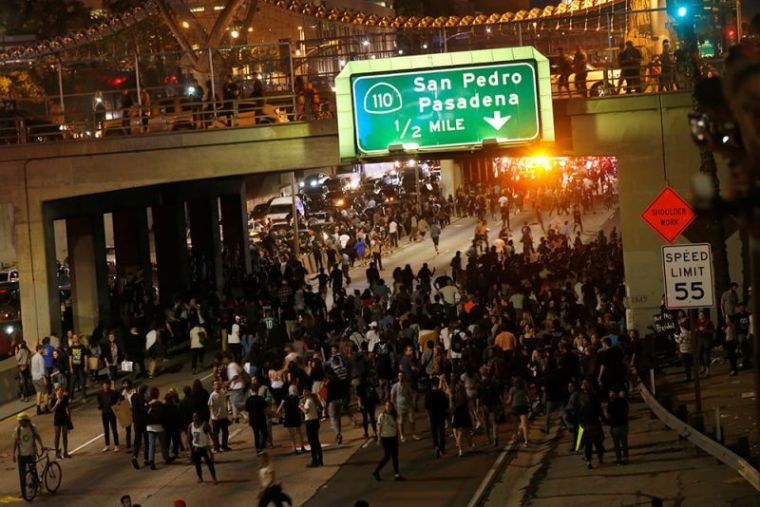 Demonstrators take over the Hollywood 101 Freeway in protest to the election of Republican Donald Trump as President of the United States in Los Angeles, California, November 10, 2016