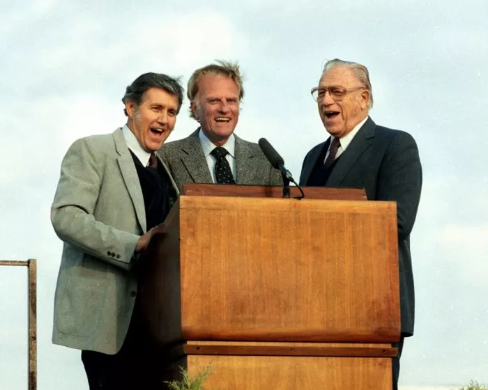 Cliff Barrows, Billy Graham and George Beverly Shea singing 'This Little Light of Mine' in 1984 in Sunderland, England.