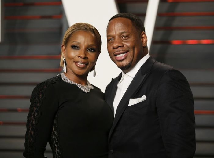 Mary J. Blige and her husband Kendu Isaacs arrive at the Vanity Fair Oscar Party in Beverly Hills, California, February 28, 2016.