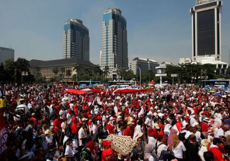 People take part in a rally against what they see as growing racial and religious intolerance in the world's largest Muslim-majority country, in Jakarta, Indonesia, November 19, 2016.