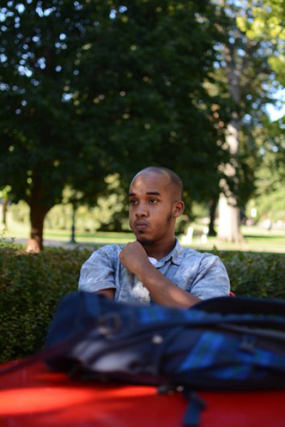 Abdul Razak Artan sits pensively on the Oval.