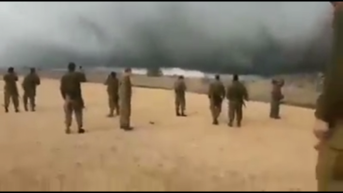 A storm cloud hovers over the Israel-Syria border, December 1, 2016.