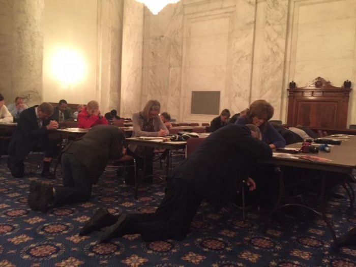 Pastors and members of Congress pray at the Congressional-Clergy Town Hall event on Capitol Hill on Wednesday November 30, 2016.