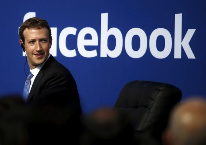 Facebook CEO Mark Zuckerberg is seen on stage during a town hall at Facebook's headquarters in Menlo Park, California, September 27, 2015.