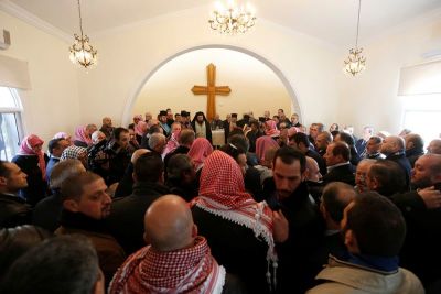 Relatives and friends of Nawras Assaf one of the victims from Istanbul's New Year nightclub attack, attend his funeral in the town of Al-Fuheis near Amman, Jordan, January 3, 2017.