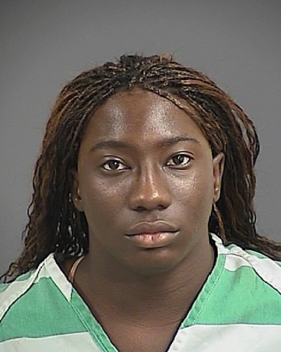 Prophetess Chyna Davis, 25, after an arrest for prostitution at age 19 in 2010 when she was known as a man named Joseph Levern Brunson.