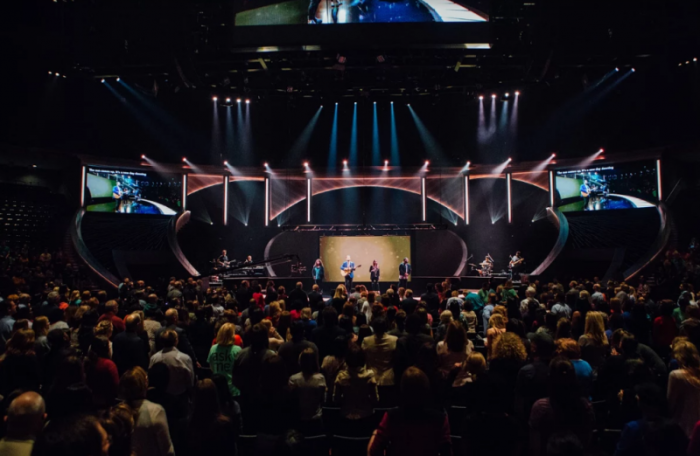 Attendees of the 2016 Mobilizing Medical Conference held at Lakewood Church in Houston, Texas listen to a musical performance.