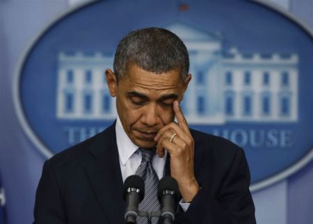 President Obama speaks during a press briefing at the White House on Dec. 14, 2012.