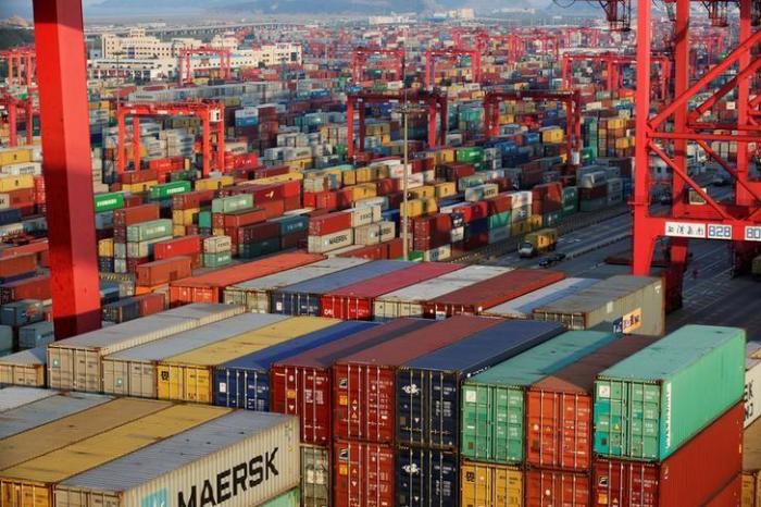 Container boxes are seen at the Yangshan Deep Water Port, part of the Shanghai Free Trade Zone, in Shanghai, China September 24, 2016.