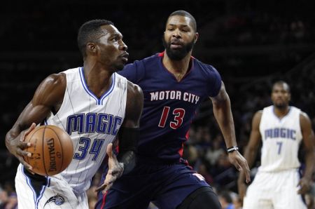 Orlando Magic forward Jeff Green (34) moves to the basket against Detroit Pistons forward Marcus Morris (13) during the second quarter at The Palace of Auburn Hills, Michigan, December 4, 2016.