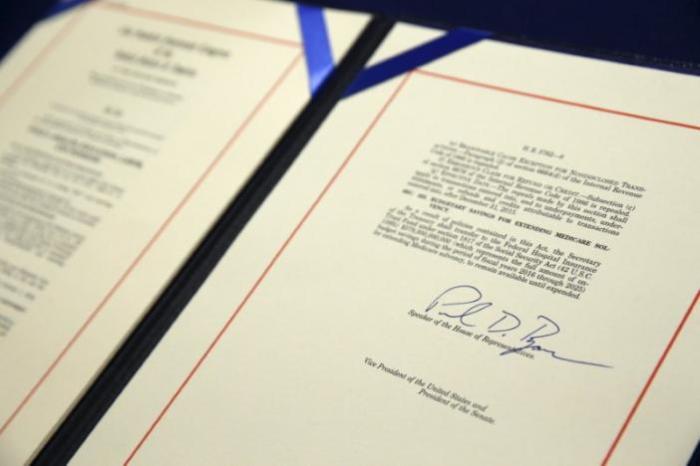 A bill repealing Obamacare sits on a desk after being signed by U.S. House Speaker Paul Ryan (R-WI) at the U.S. Capitol in Washington January 7, 2016.