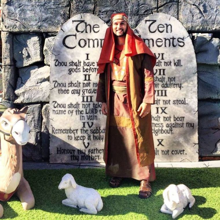 Guest service employee poses in kids section (Smile of a child) at the Holy Land Experience, 2016.