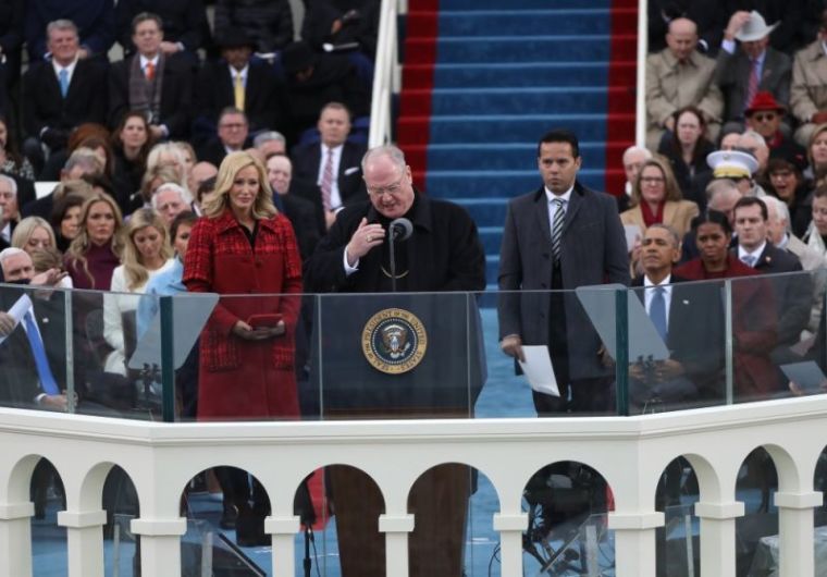 Timothy Michael Cardinal Dolan delivers the invocation before U.S. President-elect Donald Trump is sworn in by Supreme Court Chief Justice John Roberts during inauguration ceremonies in Washington, U.S., January 20, 2017.