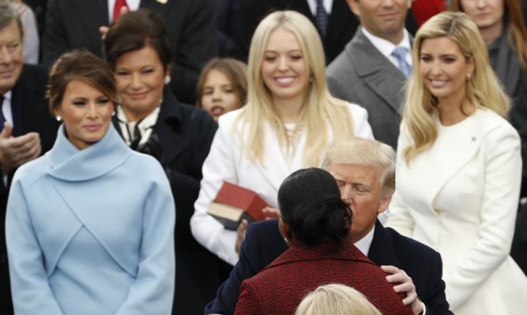 Donald Trump kisses Michelle Obama during inauguration ceremonies swearing in Donald Trump as the 45th president of the United States on the West front of the U.S. Capitol in Washington, U.S., January 20, 2017.