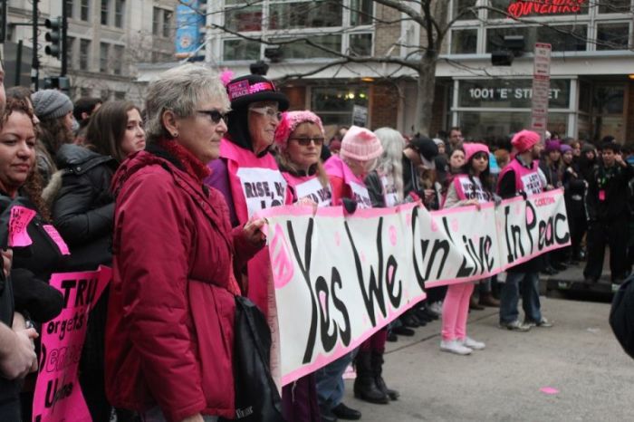 Feminist demonstrators establish a blockade outside of the inauguration entry point near 10th and E Streets in Washington, D.C. in protest of President Donald Trump on January 20, 2017.