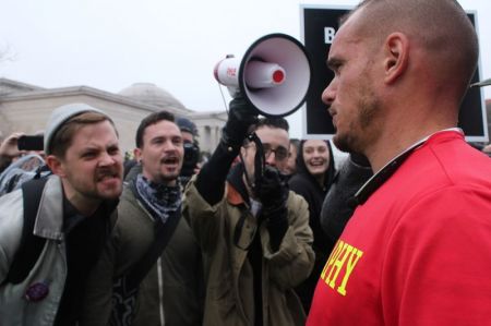 A Christian street evangelist is shouted down by a group of participants in the Women's March on Washington, D.C. on Jan. 21, 2017.