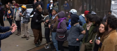 Protesters Blocking Passage to Inauguration Celebration. Police attempt to get a hold of the situation where protesters are locking arms and blocking check-point to Pennsylvania Ave.