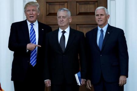 U.S. President-elect Donald Trump (L) and Vice President-elect Mike Pence (R) greet retired Marine General James Mattis in Bedminster, New Jersey, U.S., November 19, 2016.