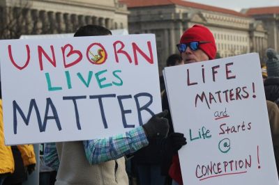 Participants in the 2017 March for Life hold up their pro-life signs in Washington, D.C. on Jan. 27, 2017.