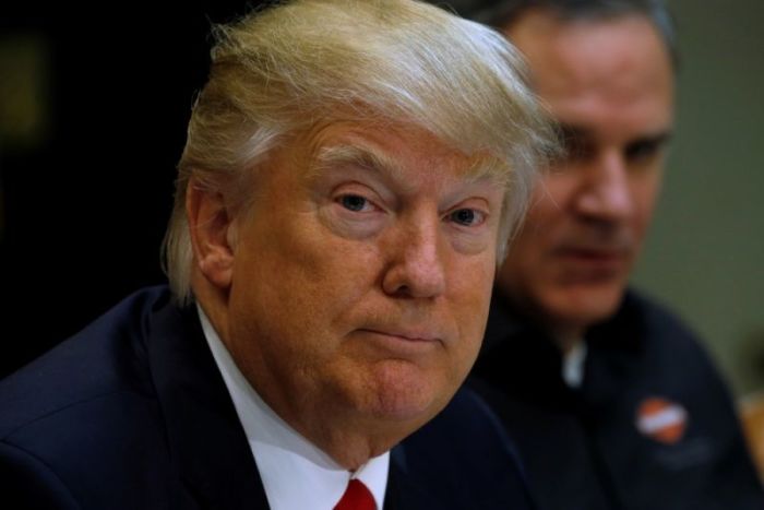 U.S. President Donald Trump meets with representatives of Harley-Davidson, including CEO Matthew Levatich (R), at the White House in Washington, U.S. February 2, 2017.