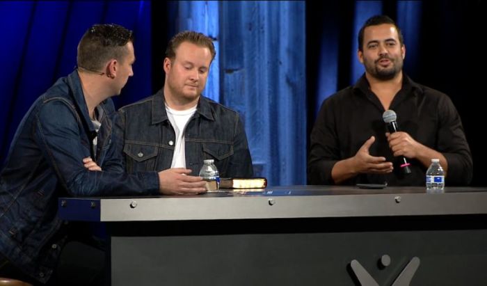 Pastor Jason Powell moderating a panel comprising Pastor Greg Laurie's son, Jonathan Laurie, and former Navy SEAL Chad Williams.